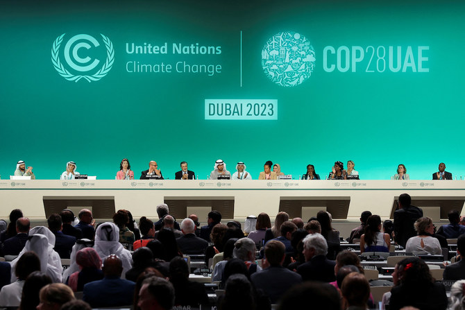 COP28 President Sultan Al-Jaber gaveled approval of the central document without asking for comments, within minutes of opening Wednesday’ session. (AFP)