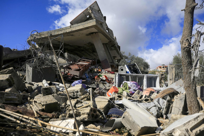 A picture taken on December 14, 2023 shows a destroyed house following Israeli bombardment during the past week, on the southern Lebanese village of Aitaroun, near the border with Israel, amid ongoing cross-border tensions between Israel and the Hezbollah. (AFP)