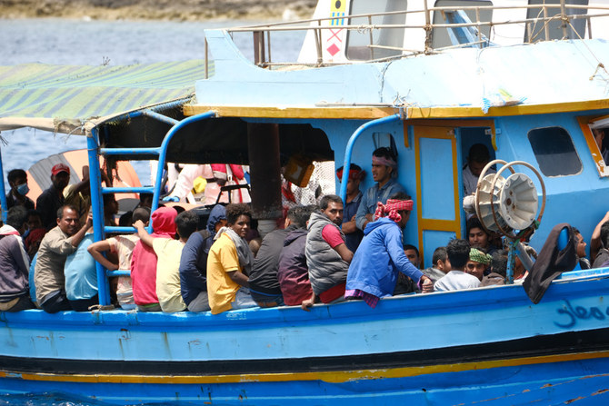 African migrants arrive in the Italian island of Lampedusa after a perilous trip across the Mediterranean Sea on July 2, 2021. (Shutterstock)