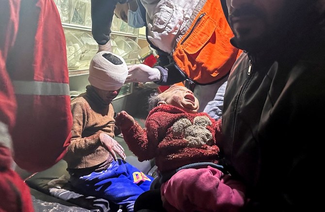 Palestinian girl Mariam Abu Akel and her brother Hamed were rescued from under the rubble of a house hit by an Israeli strike. (Reuters)