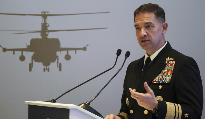 US Navy Vice Adm. Brad Cooper, who heads the Navy's Bahrain-based 5th Fleet, speaks at an event at the International Defense Exhibition and Conference in Abu Dhabi, United Arab Emirates, Feb. 21, 2023. (AP)