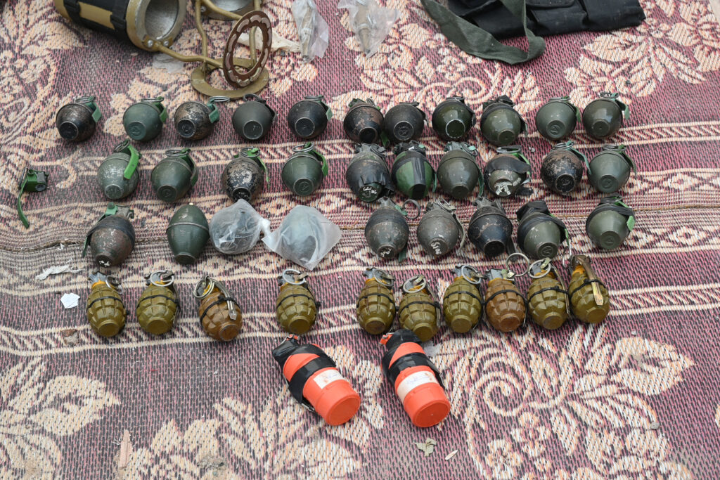 Weapons that the Israeli Army says were left behind by Hamas militants in the Al-Shifa hospital, are displayed at the medical complex in Gaza City in the northern Gaza Strip. (AFP)