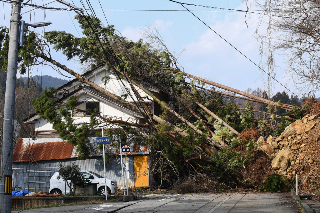 Around 56,000 homes are still without running water, while around 12,600 households face power outages. (AFP)