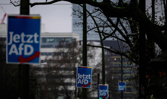 Election placards for the far-right Alternative fuer Deutschland party are tied to lamp posts in Berlin on Jan. 2, 2024. (AFP)