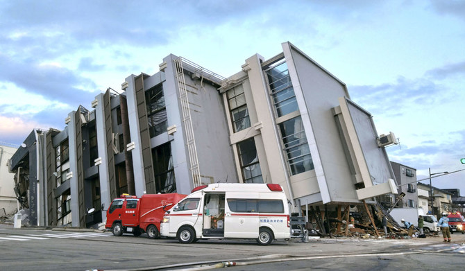 A collapsed building caused by an earthquake is seen in Wajima, Ishikawa prefecture, Japan January 2, 2024, in this photo released by Kyodo. (REUTERS)