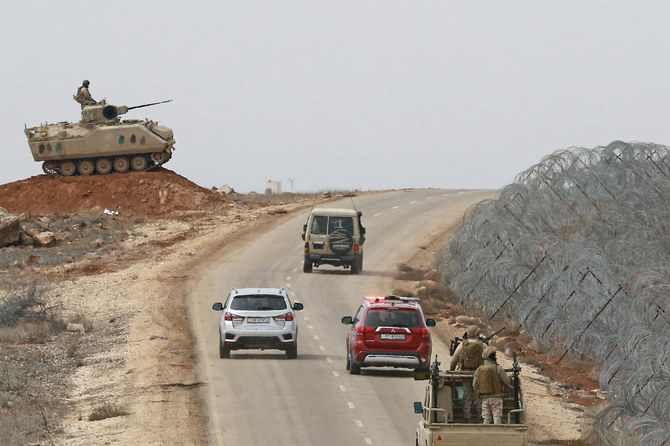 This picture taken on February 17, 2022, shows Jordanian soldiers patrolling along the border with Syria to prevent drug trafficking. (AFP)