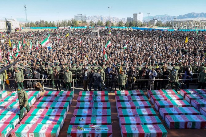 Iranian President Ebrahim Raisi joined mourners in Kerman on Jan. 5 for the funerals of the 89 people killed in twin blasts claimed by Daesh (IRANIAN PRESIDENCY/AFP)