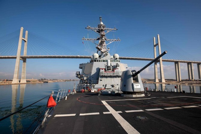 In this image obtained from the US Department of Defense, the Arleigh Burke-class guided-missile destroyer USS Laboon transits the Suez Canal on December 18, 2023. (AFP)