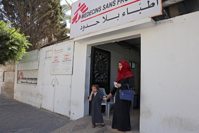 Following the attack, workers and their families moved to another location. (File/AFP)