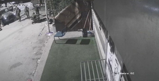 An Associated Press review of the video and interviews with the two wounded men indicate that Israeli soldiers opened fire on the three when they did not appear to pose a threat. (UGC via AP)