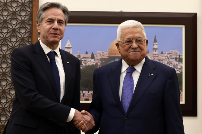 US Secretary of State, Antony Blinken, left, meets with Palestinian president Mahmud Abbas, right, in Ramallah in the Israeli-occupied West Bank on Wednesday, Jan. 10, 2024, during his week-long trip aimed at calming tensions across the Middle East. (Jaafar Ashtiyeh/Pool Photo via AP)