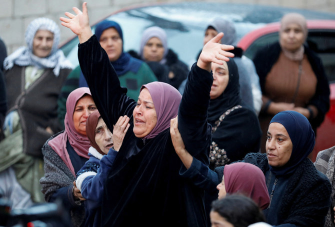 Palestinians attend the funeral of Majdi Fashafshe, who was shot dead by Israeli security forces during a raid in Jenin in the occupied West Bank. (Reuters)