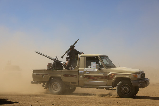 A pick-up truck carrying Houthi supporters can be seen near Sanaa, Yemen January 14, 2024. (Reuters)