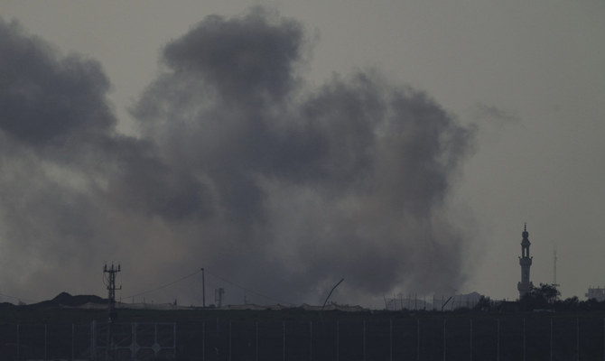 Smoke rises following an Israeli bombardment in the Gaza Strip, as seen from southern Israel, Sunday, Jan. 14, 2024. (AP)