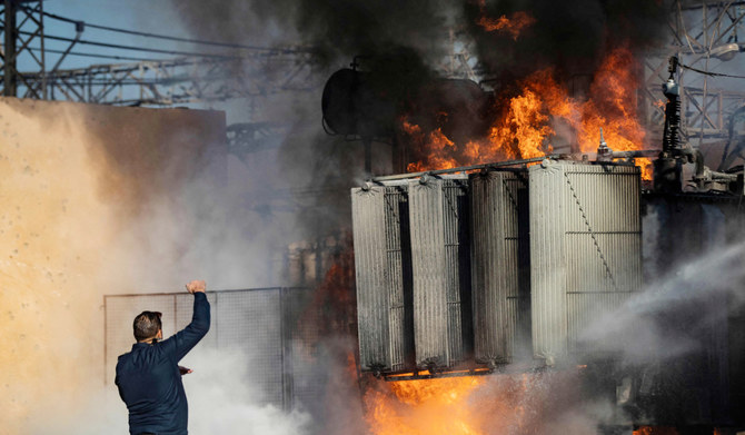 Kurdish Syrian firemen put out a blaze at a power station in Qamishli which was reportedly targeted by Turkish drones on January 15, 2024 as Turkey carried out another series of airstrikes against Kurdish sites in northeastern Syria and northern Iraq in what Ankara said was a response for the deaths of nine Turkish soldiers. (AFP)