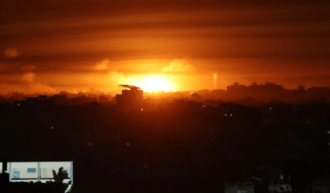 A picture taken from Rafah shows fire erupting over Khan Yunis in the southern Gaza Strip, during Israeli bombardment on January 16, 2024, amid ongoing battles between Israel and the Palestinian militant group Hamas. (AFP)