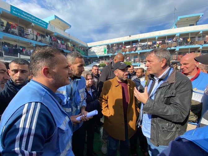 UNWRA Commissioner-General Philippe Lazzarini meets with Palestinians at a refugee center in the Gaza Strip last week. (X: @UNLazzarini)