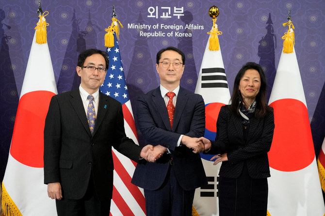 Kim Gunn, special representative for Korean Peninsula Peace and Security, poses with Namazu Hiroyuki, Japan's director-general and assistant minister of the Asian Oceanian Affairs Bureau, and Jung Pak, US senior official for North Korea, at their trilateral meeting at the Foreign Ministry in Seoul, South Korea, on Jan. 18, 2024. (Pool via REUTERS)