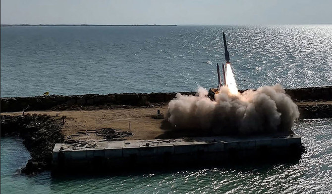 A handout picture provided by the Iranian Army media office on January 19, 2024, shows the launch of a missile during a military drill at an undisclosed location in southern Iran. (AFP)