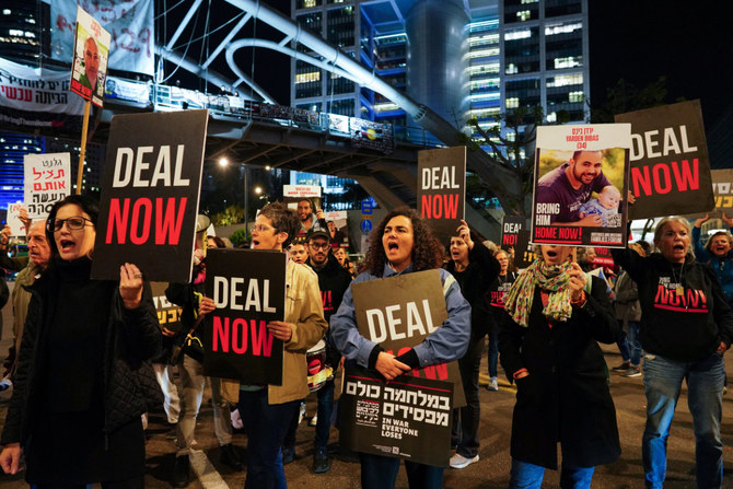 Families of hostages and supporters block a road during a demonstration in Tel Aviv, Israel, on January 18, 2024, to call for the immediate release of hostages kidnapped on the deadly October 7 attack by Hamas militants. (REUTERS)