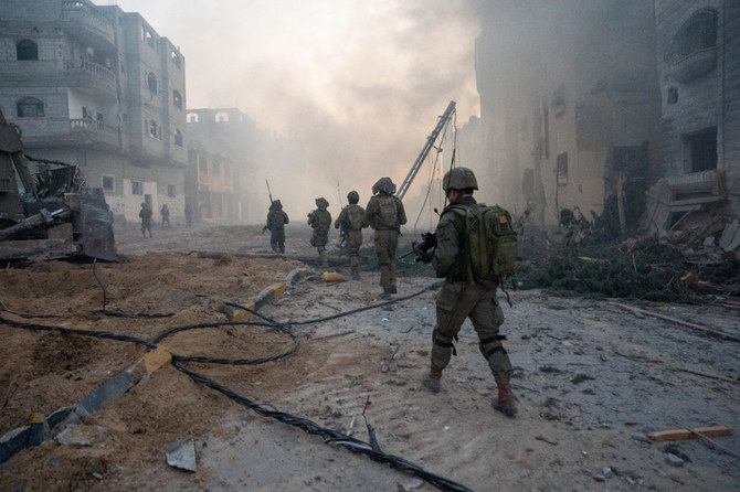 Israeli soldiers operate in the Gaza Strip amid the ongoing conflict between Israel and the Palestinian Islamist group Hamas (Reuters)