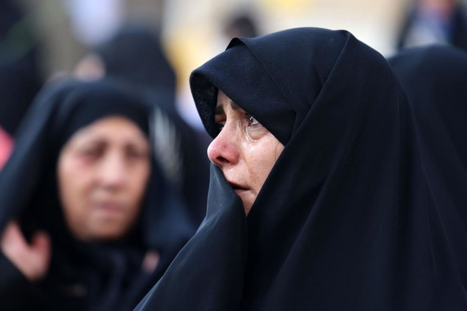 Mourners in Tehran attend the funeral of three Iranian Revolutionary Guard Corps (IRGC) members killed in Damascus in a strike blamed on Israel. (AFP)