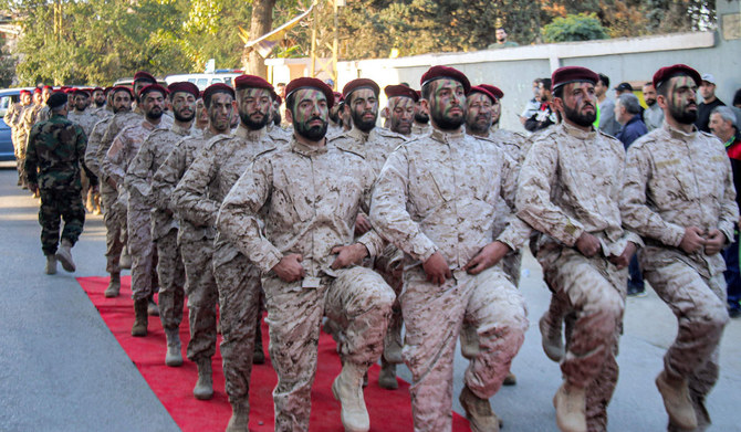 Fighters of the Lebanese Shiite movement Hezbollah marching during a military parade commemorating their