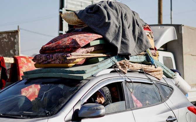 Palestinians, who fled Khan Younis due to the Israeli ground operation, arrive in Rafah, southern Gaza Strip, Jan. 22, 2024. (Reuters)