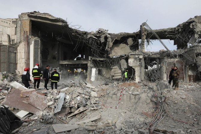 A civil defence team carries out search & rescue operations following a missile strike launched by the IRGC. Jan. 17, 2024 (AFP)