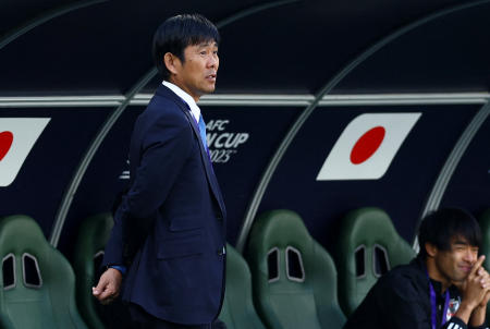 Japan coach Hajime Moriyasu looks on during the warm-up before the match. (Reuters)