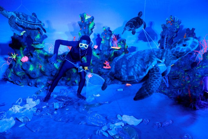 Picture taken in a space at the Citizen Village where visitors can pretend they help clean the ocean, during the 8th World Water Forum taking place in Brasilia, on March 20, 2018. (AFP)