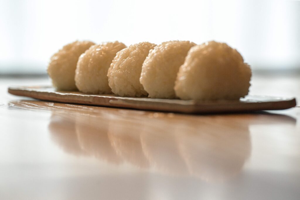 This photo taken on December 7, 2023 shows rice balls, known as
