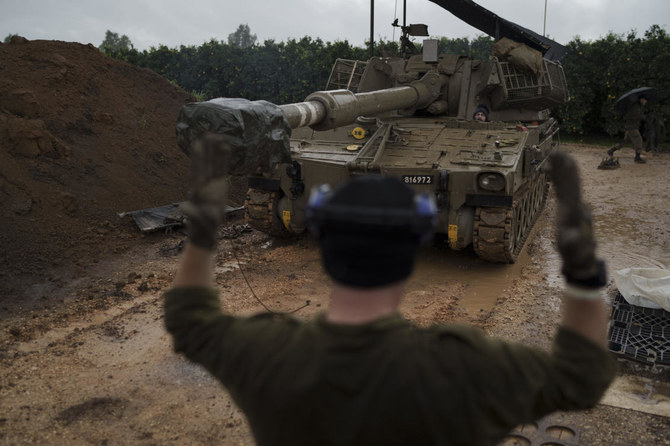 An Israeli mobile howitzer gets into position near the border with Lebanon in northern Israel, on Jan. 11, 2024. (AP)