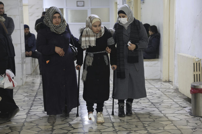 Yasmine Shahoud arrives for physical therapy at a hospital in Idlib. Yasmine was seriously injured and lost all of her immediate family in an earthquake in an earthquake that hit Syria and Turkey. (AP)