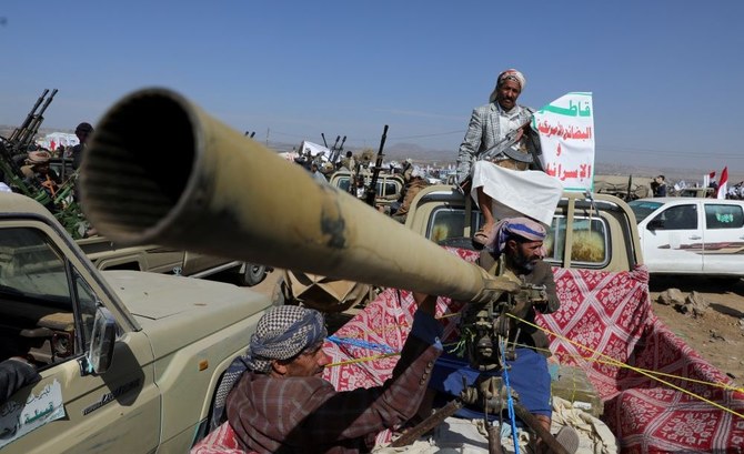 Houthi tribesmen parade in a show of defiance after US and UK air strikes on Houthi positions near Sanaa, Yemen, Feb. 4, 2024. (Reuters)