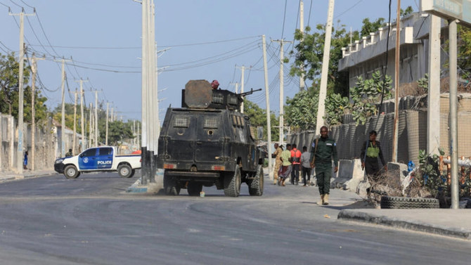 Security forces outside a building which was attacked by militants in Mogadishu, Somalia. (AFP/File)
