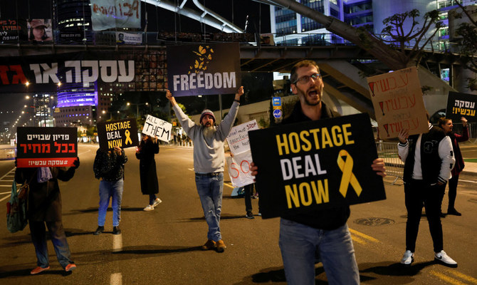 Supporters of hostages take part in a protest calling for their release, amid the ongoing conflict between Israel and the Palestinian Islamist group Hamas, in Tel Aviv, Israel, February 11, 2024. (Reuters)