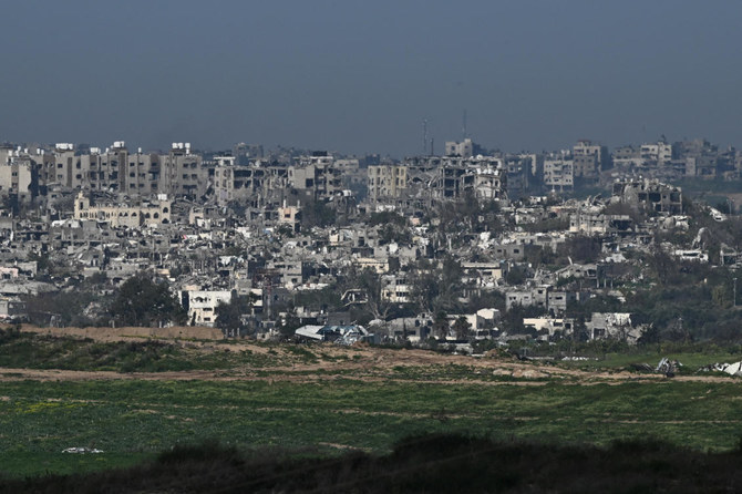 Buildings lie in ruin in Gaza, amid the ongoing conflict between Israel and the Palestinian Islamist group Hamas, as seen from Israel, February 13, 2024. (Reuters)