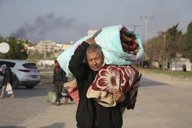 Palestinians fleeing the Israeli offensive on Khan Younis arrive at Rafah, Gaza Strip. Wednesday, Feb. 14, 2024. (AP)