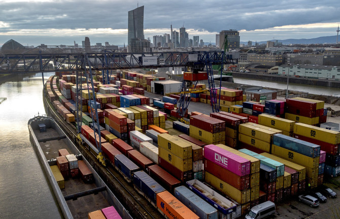Containers are pictured in the small harbor in Frankfurt, Germany, on Feb. 13, 2024. In the background are the ECB and other buildings of the banking district. (AP Photo)