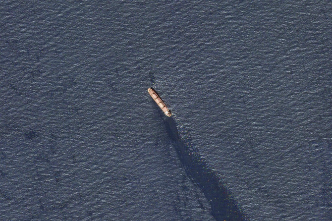 The Belize-flagged bulk carrier Rubymar is seen in the southern Red Sea near the Bay El-Mandeb Strait leaking oil after an attack by Yemen’s Houthi rebels on Feb. 20, 2024. (Planet Labs PBC via AP)