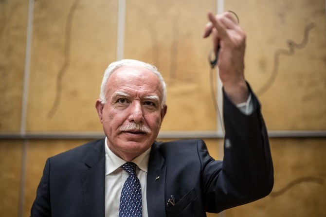 Palestinian foreign minister Riyad Al-Maliki speaks during a press conference on the sideline of the 55th session of the Human Rights Council in Geneva on Feb. 28, 2024. (AFP)