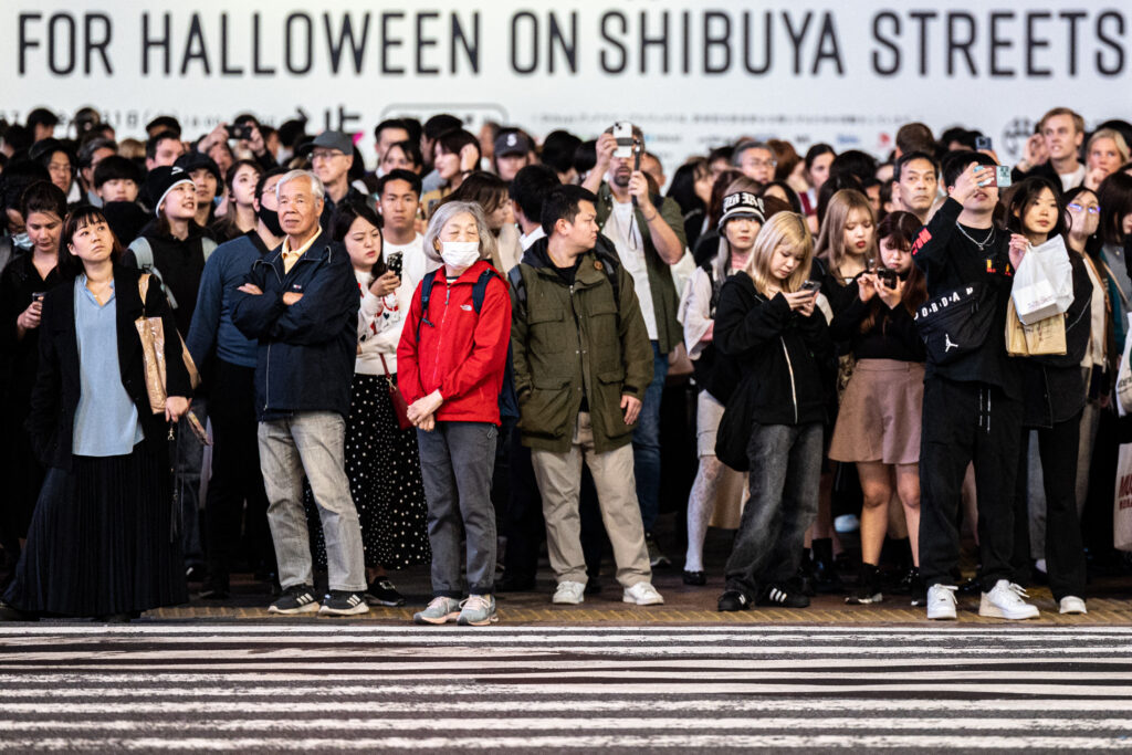 The share of respondents who think that Japan is safe fell 3.9 points to 64.7 percent. (AFP)