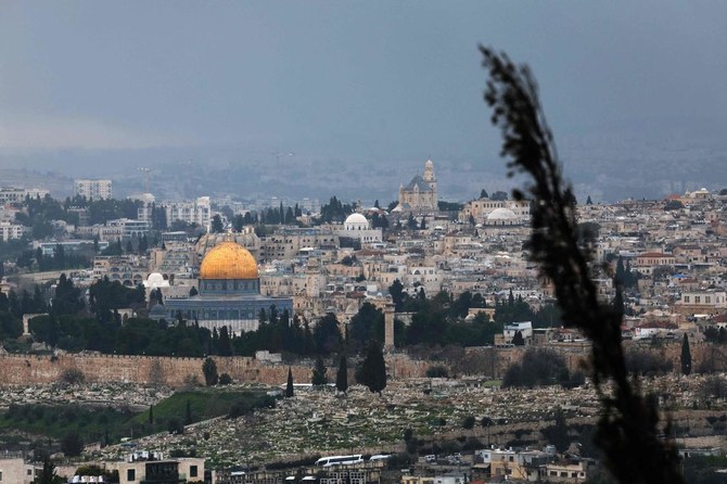 A picture shows a view of the Al-Aqsa mosque complex and its Dome of the Rock mosque (L) on a foggy day in Jerusalem’s Old City on February 19, 2024. (AFP)