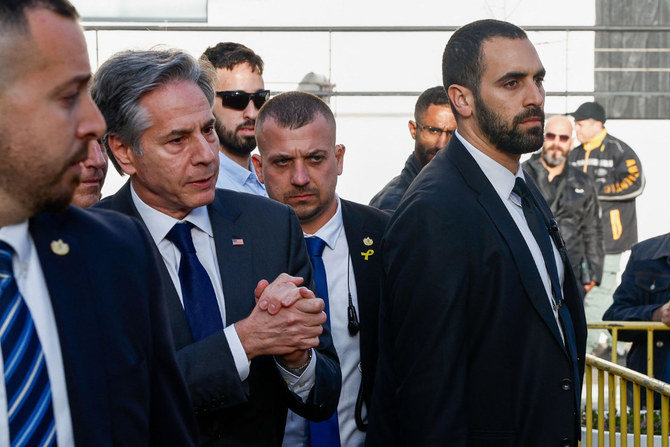 US Secretary of State Antony Blinken (2L) talks to relatives and supporters of Israelis held hostage in Gaza since the October 7 attacks by Palestinian militants, as they rallied in Tel Aviv to call on the US to intervene for their release on March 22, 2024. (AFP)