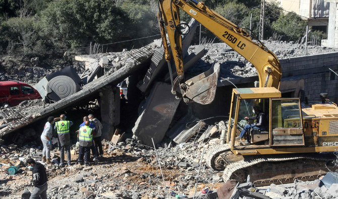 Residents and rescuers check the destruction after an overnight Israeli bombardment in the southern Lebanese village of Kafra, on February 29, 2024. (AFP/File)