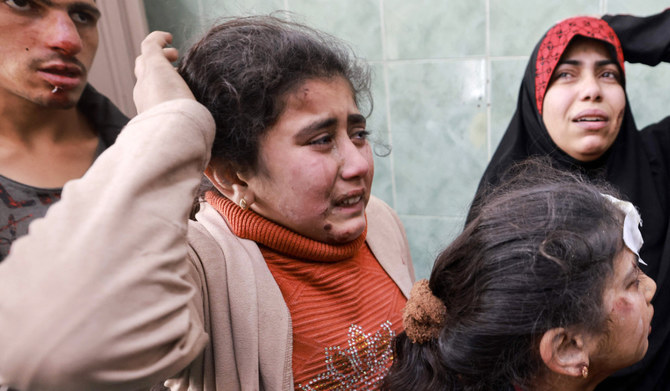 Children injured in Israeli bombardment, await treatment at the al-Najjar hospital in Rafah in the southern Gaza Strip on March 1, 2024, amid ongoing battles between Israel and the Palestinian Hamas movement. (AFP)