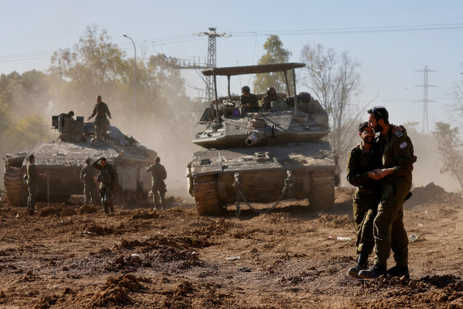 Israeli soldiers after returning from the Gaza strip, amid the ongoing conflict between Israel and Palestinian Islamist group Hamas, in southern Israel. (Reuters)