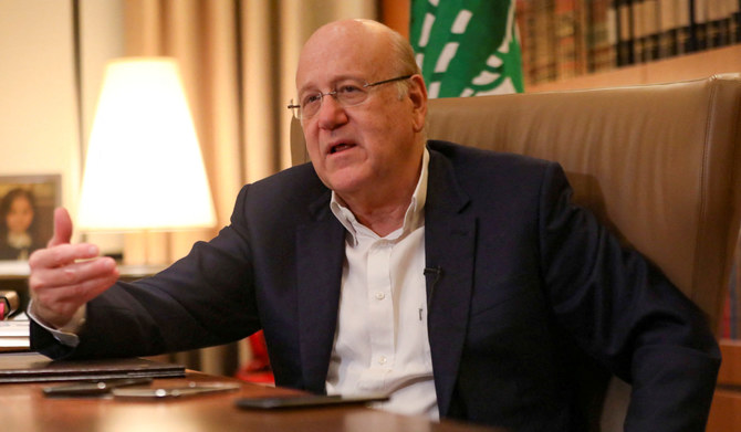 Lebanese Prime Minister Najib Mikati speaks during an interview with Reuters at the government palace in Beirut, Lebanon October 14, 2021. (REUTERS)