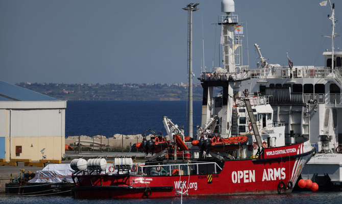 Humanitarian aid for Gaza is loaded on a platform next to a rescue vessel of the Spanish NGO Open Arms at the port of Larnaca, Cyprus March 11, 2024. (Reuters)